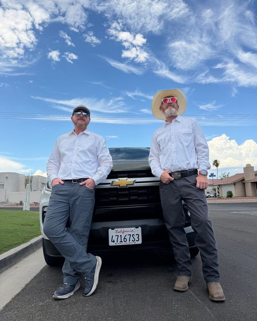 Curry and Kyle Conaway, the brothers behind Conaway Pest Control, standing in front of their service truck